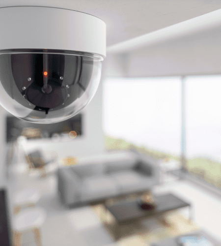 Security camera monitoring interior space for enhanced safety and 24-hour surveillance, aligned with TRG's logistics and inventory management services.